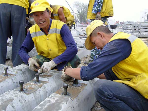 glue the rail spikes on the concrete sleepers